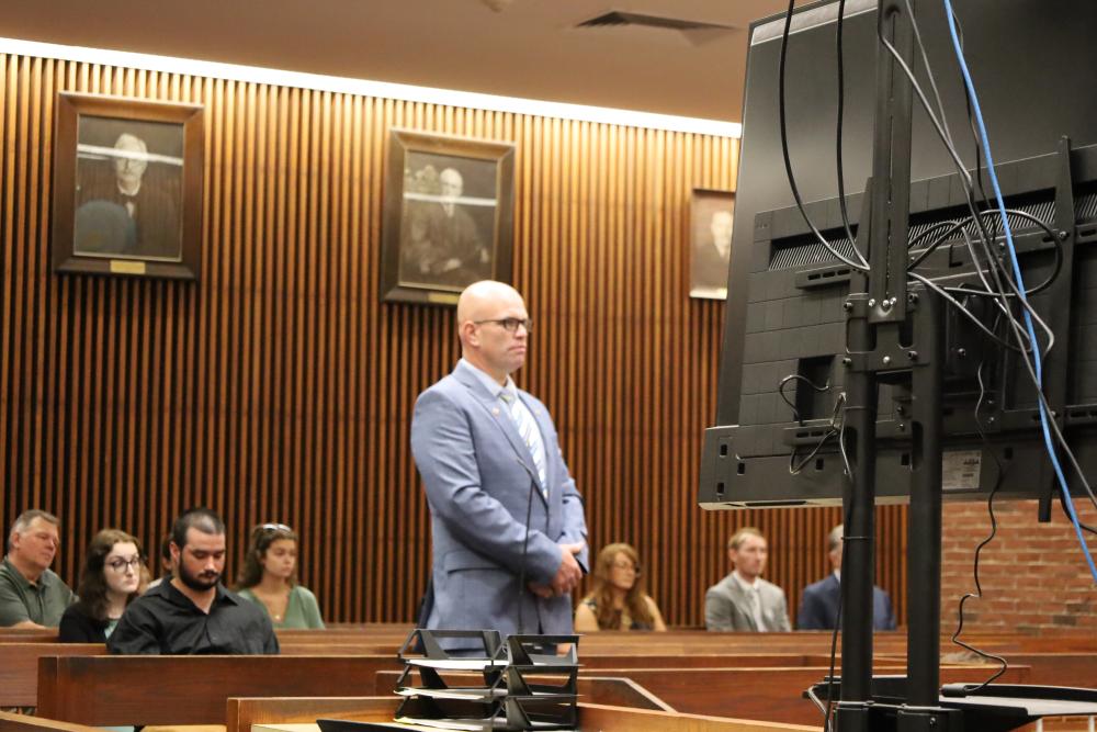 Selectman Jared Chadwick stands in the courtroom on Thursday, July 9. Photos by Nick Mossman