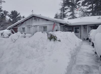 No, this home isn't painted white, that's snow coverage! Photo source: Larry Trahan