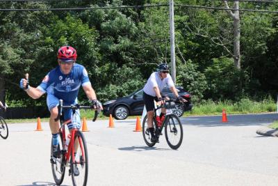This rider gave onlookers a thumbs up while passing by. 