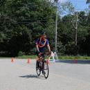 A rider says aloha to the water stop.