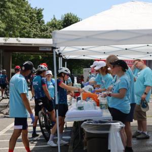 Volunteers served food and water for the tired cyclists. 